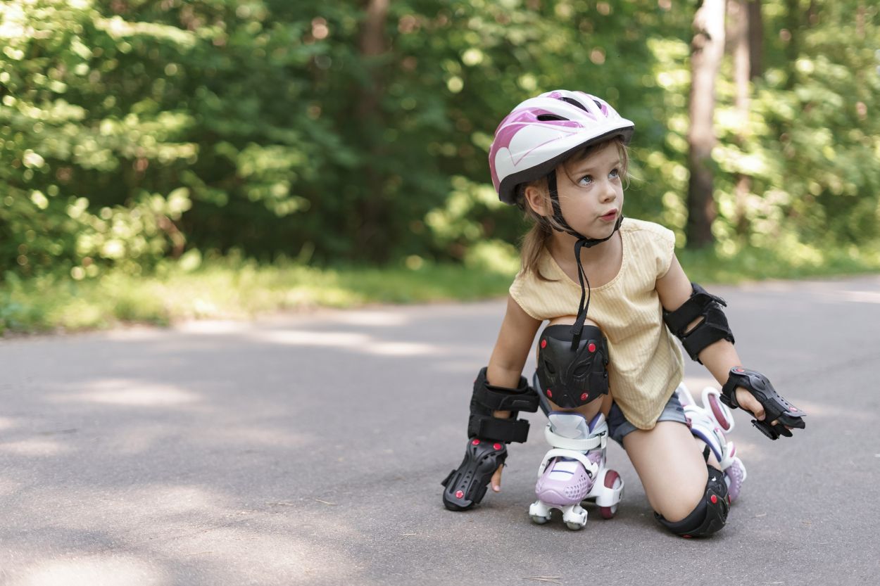 Girl learning roller skate